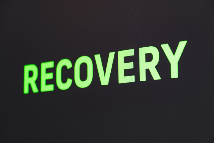 The word, RECOVERY in green text