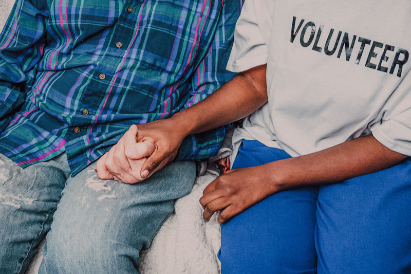 Man and woman holding hands
