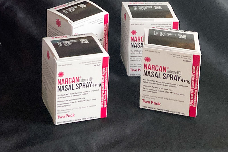 Four Narcan nasal spray packages