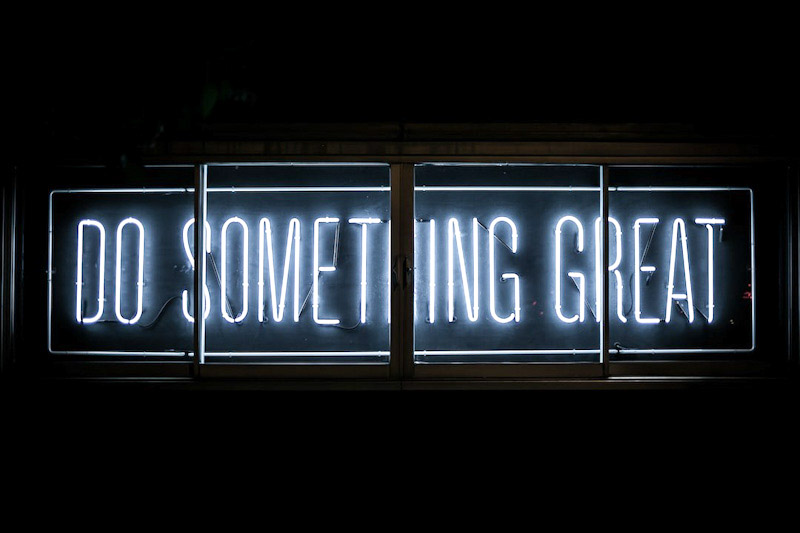 Neon sign reading, Do something great